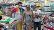 Supermarket swipe: Rubi Ferreira shows off her e-card&mdash; simple tasks such as shopping can be a huge challenge for trans people. Photo: WFP/Hetze Tosta