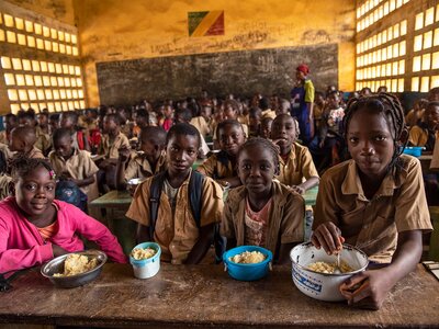 Gaelvie and her classmates during lunchtime at Madingou Gare School, Bouenza Department.
