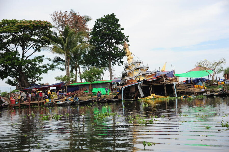 The pagoda-top of a building is immersed in water 