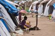 a boy in a camp